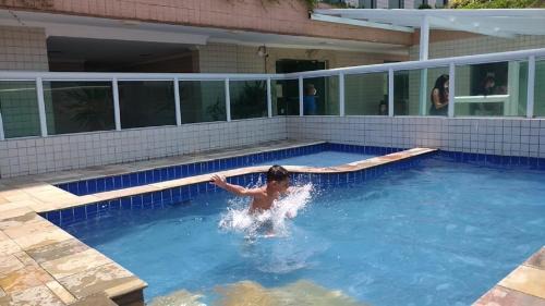 Aviacao Apartamento | Apê Temporada II Praia Grande SP Completo com Piscina, Churrasqueira, Estacionamento