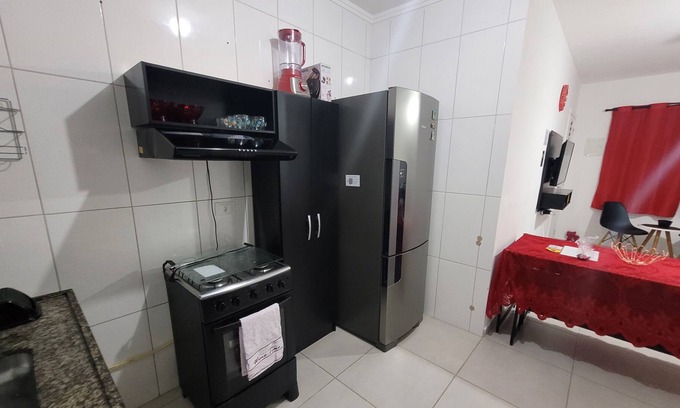Jardim Neptunia Apartamento | Apartamento Térreo com Churrasqueira e Rede a 300m da Praia