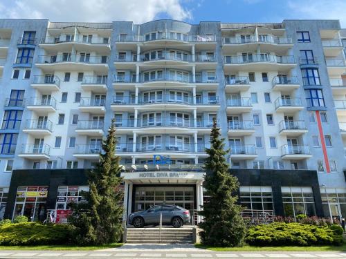 Dzielnica Uzdrowiskowa Apartamento | Apartament prywatny salon z aneksem kuchennym, sypialnią w hotelu DIVA