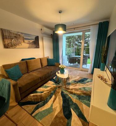 Dzielnica Uzdrowiskowa Apartamento | Apartament Whiteblue Dream 2 Kołobrzeg z ogródkiem & sauna & fitness & bawialnia dla dzieci