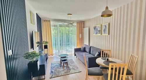 Dzielnica Uzdrowiskowa Apartamento | Apartament Whiteblue Kołobrzeg z dużym ogródkiem - 100 m od plaży! Whiteblue Kolberg Apartment mit großem Garten - 100 m vom Strand entfernt! Whiteblue Kołobrzeg Apartmán s velkou zahradou - 100 m od pláže!