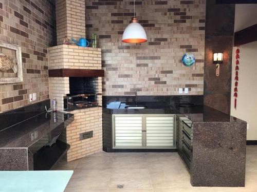 Enseada Azul Apartamento | Apartamento com área externa na Bacutia - uma quadra do mar
