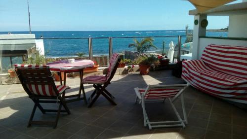 Puerto Lajas Apartamento | Apartamento con encanto en la playa frente al mar "Posada Rent House"