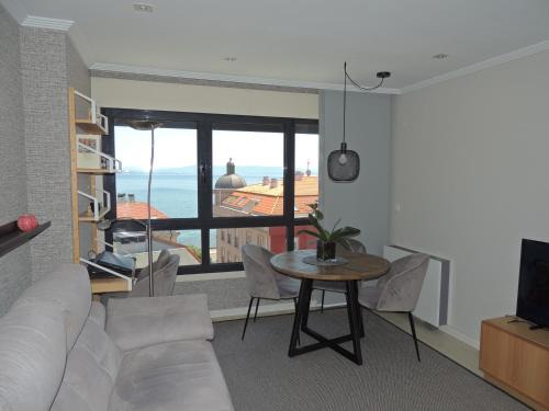 Dean Pequeno Apartamento | Apartamento con vistas al mar y playa enfrente