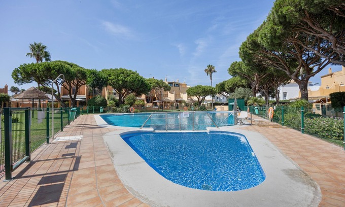 Poblado Sancti Petri Apartamento | Apartamento 'Apartamento Arrecife D' con vistas al mar, piscina compartida y Wi-Fi