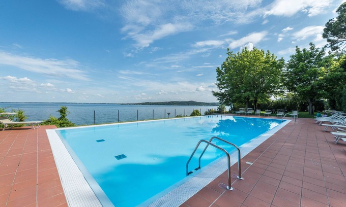 Padenghe sul Garda Apartamento | Apartamento 'Appartamento Sogno sul Garda' con piscina privada, Wi-Fi y aire acondicionado
