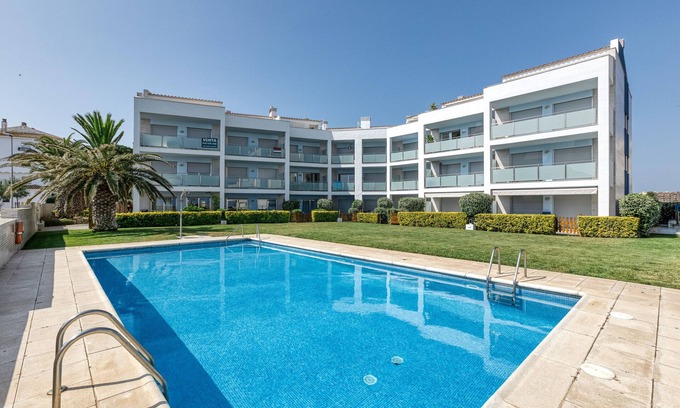 L'Escala Apartamento | Apartamento 'Apartamento Moll Con Piscina' con vistas a la montaña, piscina y aire acondicionado
