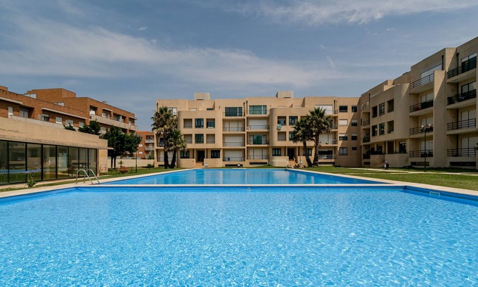Apulia Apartamento | Apartamento 'Apuliamar' con piscina compartida, jardín compartido y Wi-Fi