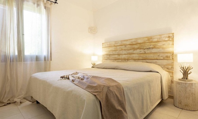 La Conia Apartamento | Apartamento "Casa Federica" cerca de la playa con aire acondicionado, Wi-Fi, terraza y jardín