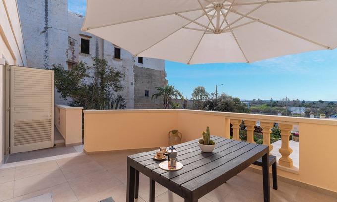 Alezio Apartamento | Apartamento 'Casa Vacanza Sotto La Lizza' con terraza privada y aire acondicionado