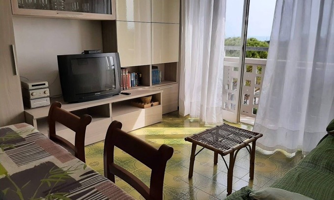Marcelli Apartamento | Apartamento con piscinas y parque a tiro de piedra del mar.