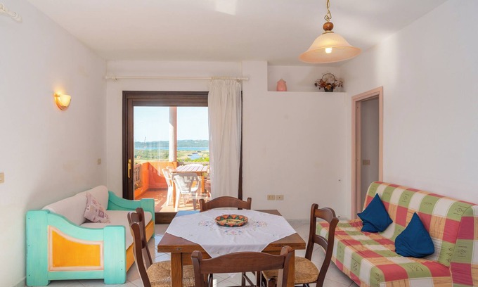 Barrabisa Apartamento | Apartamento "Conchiglia Rosa" con jardín compartido, vistas al mar y Wi-Fi