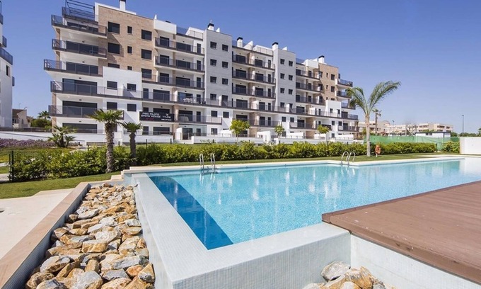 Mil Palmeras Apartamento | Apartamento en Mil Palmeras con vistas al mar, piscina, jardín, terraza, aire acondicionado y Wi-Fi