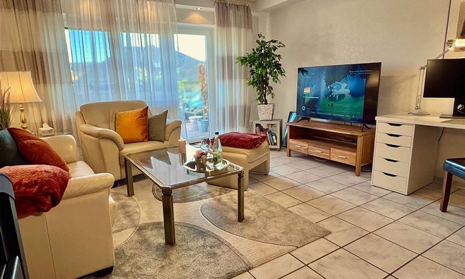 Aarbergen Apartamento | Apartment GoodTimes, ground floor, 2 x 50" TV, Netflix, south-facing terrace w. Access to the parking lot