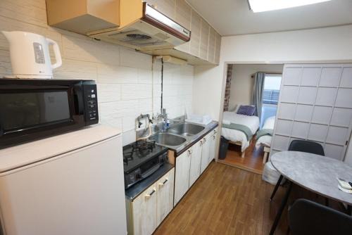 Nanbasennichimae Apartamento | Apartment House Sanyo Green Heights 505