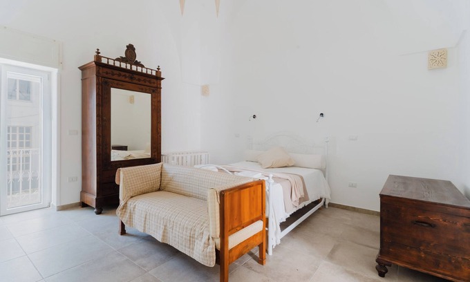 Uggiano la Chiesa Apartamento | Apartamento 'Ilios' con terraza compartida, Wi-Fi y aire acondicionado