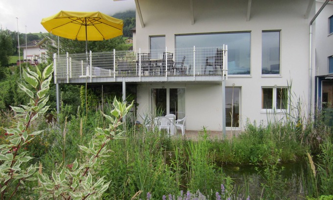 Buochs Apartamento | Apartamento en una casa de familia, con impresionantes vistas del lago y las montañas