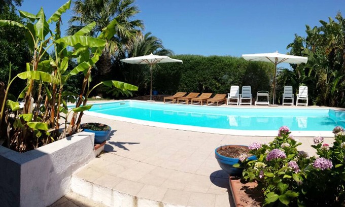 Porto San Paolo Apartamento | Apartamento con piscina privada con vistas a TAVOLARA