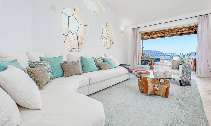 Golfo Aranci Apartamento | Apartamento 'La Perla di Sherden' con vistas al mar, Wi-Fi y aire acondicionado
