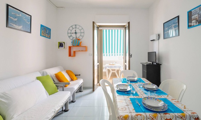 Rivabella Apartamento | Apartamento 'La Playa Rivabella' con vistas al mar, balcón y aire acondicionado