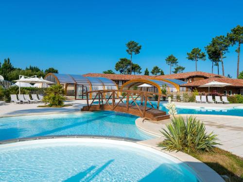Parentis-en-Born Apartamento | Apartment Les Cottages du Lac T3 by Interhome