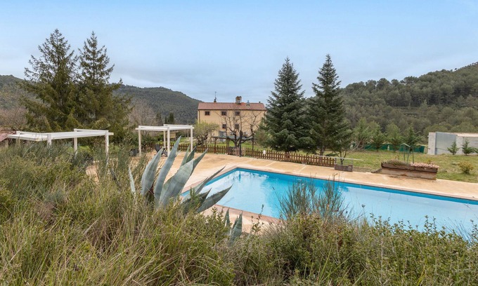 Jorba Apartamento | Apartamento 'Les Muntades Terra' con vistas a la montaña, Wi-Fi y aire acondicionado.