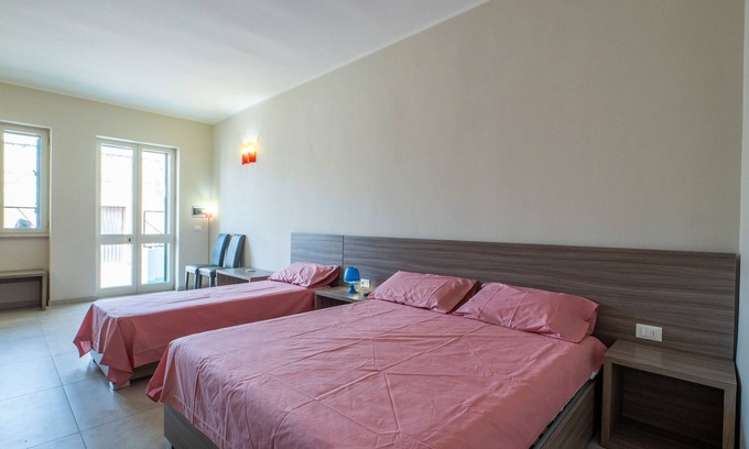Porto Cesareo Apartamento | Apartment 'Monolocale Petraroli Esterno' with Shared Garden, Balcony and Air Conditioning