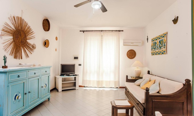 Villa San Pietro Apartamento | Apartamento "Piccola casa Marina" cerca de la playa con aire acondicionado y jardín