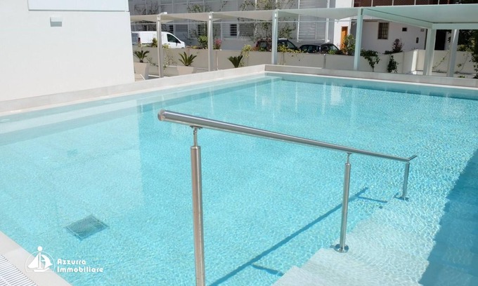 Jesolo Apartamento | Apartamento 'Residence Bafjle 42' con piscina compartida, terraza privada y aire acondicionado.