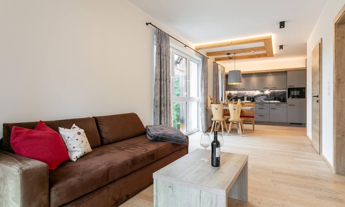 Haus im Ennstal Apartamento | Apartment with a private sauna and a balcony