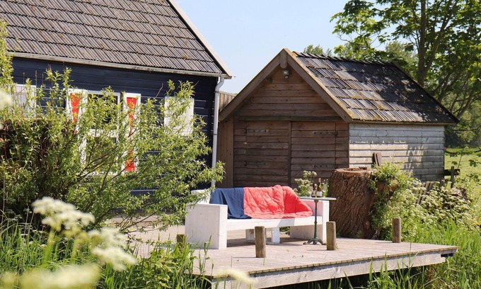Lekkum Apartamento | Acogedora casa de huéspedes en Lekkum con terraza y vista