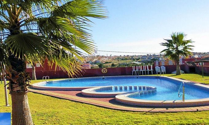 Orihuela Costa Apartamento | Apartamento con gran solarium en la azotea, Piscina, Jardín, Barbacoa, A/C y Wi-Fi