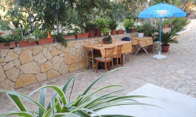 Mirce Apartamento | Apartments Guerieri - Apartamento de dos habitaciones con terraza y vistas al jardín (A1)