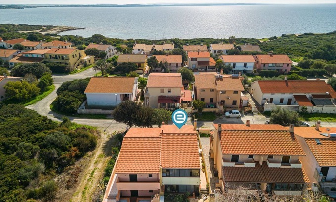 Capo Mannu Casa | Appartamento fiorito