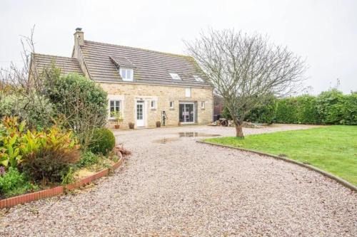 Sainte-Marie-du-Mont Apartamento | Appartement cosy à Sainte-Marie-du-Mont avec jardin 25m²