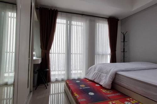 Ciputat Apartamento | Apt Breeze Bintaro 1BR with Pool, Wi-Fi and Netflix by Damaresa