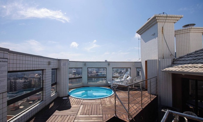 Capao da Canoa Apartamento | Apto c churrasq, piscina e wi-fi a 200m da praia
