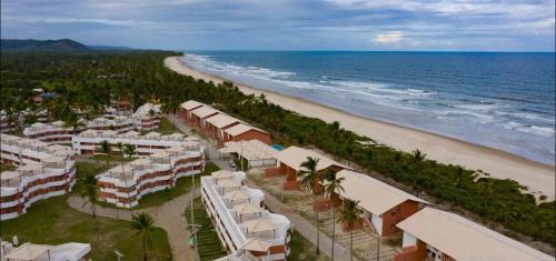 Aritagua Apartamento | Apto em condomínio na praia, com terraço, em Ilhéus-BA