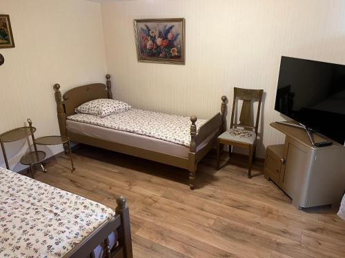 Birzai Apartamento | Arbatinės apartamentai - Močiutės namelis