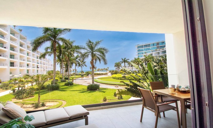 Flamingos Condominio | Aria Ocean View Condo 206 by Kivoya