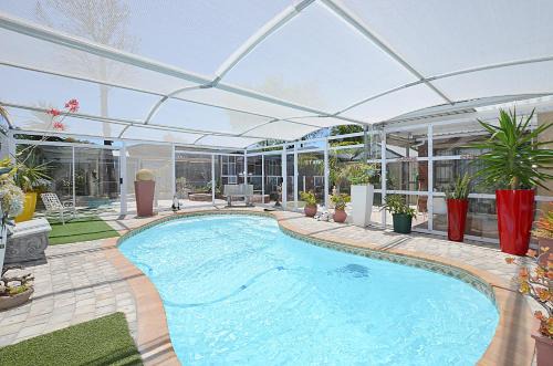 Bloubergstrand Casa | Arum Field Accommodation