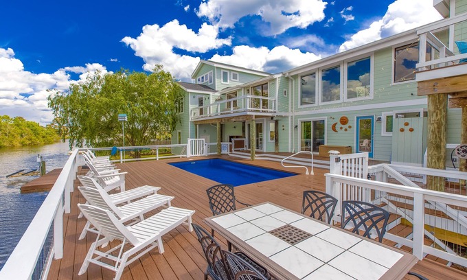 Sandbridge Casa | Attractive canal-front home w/private pool, WiFi, washer/dryer, central AC, deck