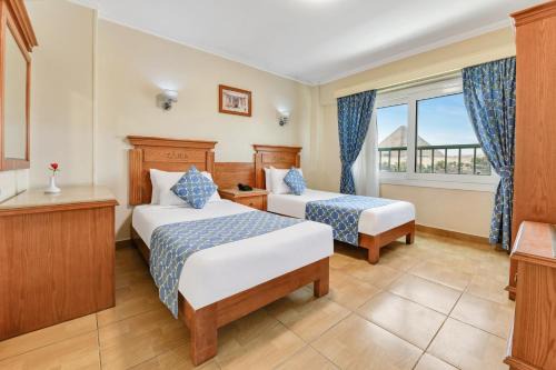 Shurtah al-Dakhlah Hotel | Aura Inn Tiba Pyramids Hotel