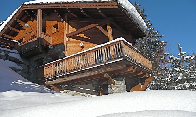 Courchevel Chalet De Esquí | Auténtico chalet confortable al pie de las pistas en Courchevel