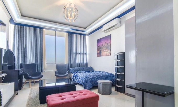 Lahug Apartamento | Avenir Condo for rent near IT Park Cebu with FREE Netflix, 49-inch Samsung Curve TV