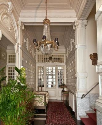 Statiekwartier Cama Y Desayuno | B&B The Baron