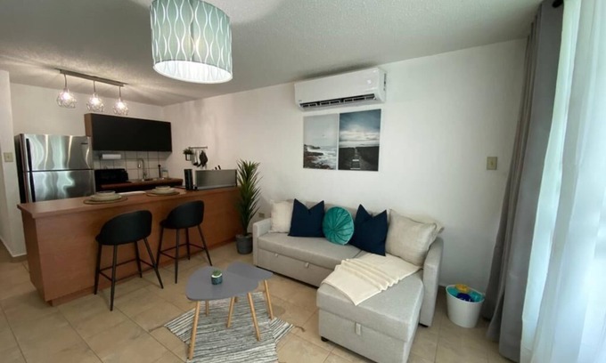 La Mela Condominio | Relax at Bahía Real – Poolside Balcony Escape