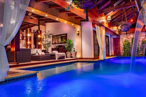 Noord Casa | Bali Retreat Aruba -2 Pools,Cinema,Yoga,Cave