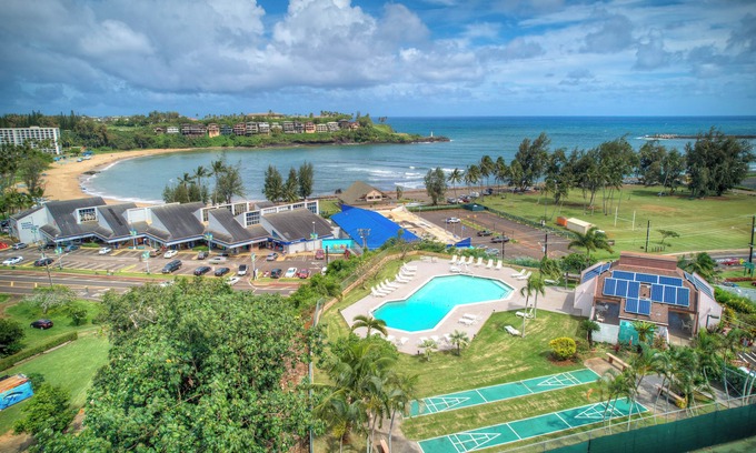 Nawiliwili Condominio | Banyan Harbor #E56, Walk to Beach, Wifi, AC, Pool, Parking, Laundry