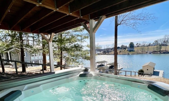 Moneta Casa | Barefoot Retreat, Private Lakefront w/ Covered Porches + Beach, Docks, Hot Tub & Fire Pit!